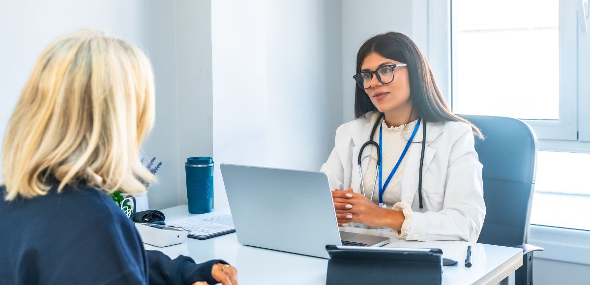 Functional medicine provider reviewing autoimmune lab results with patient