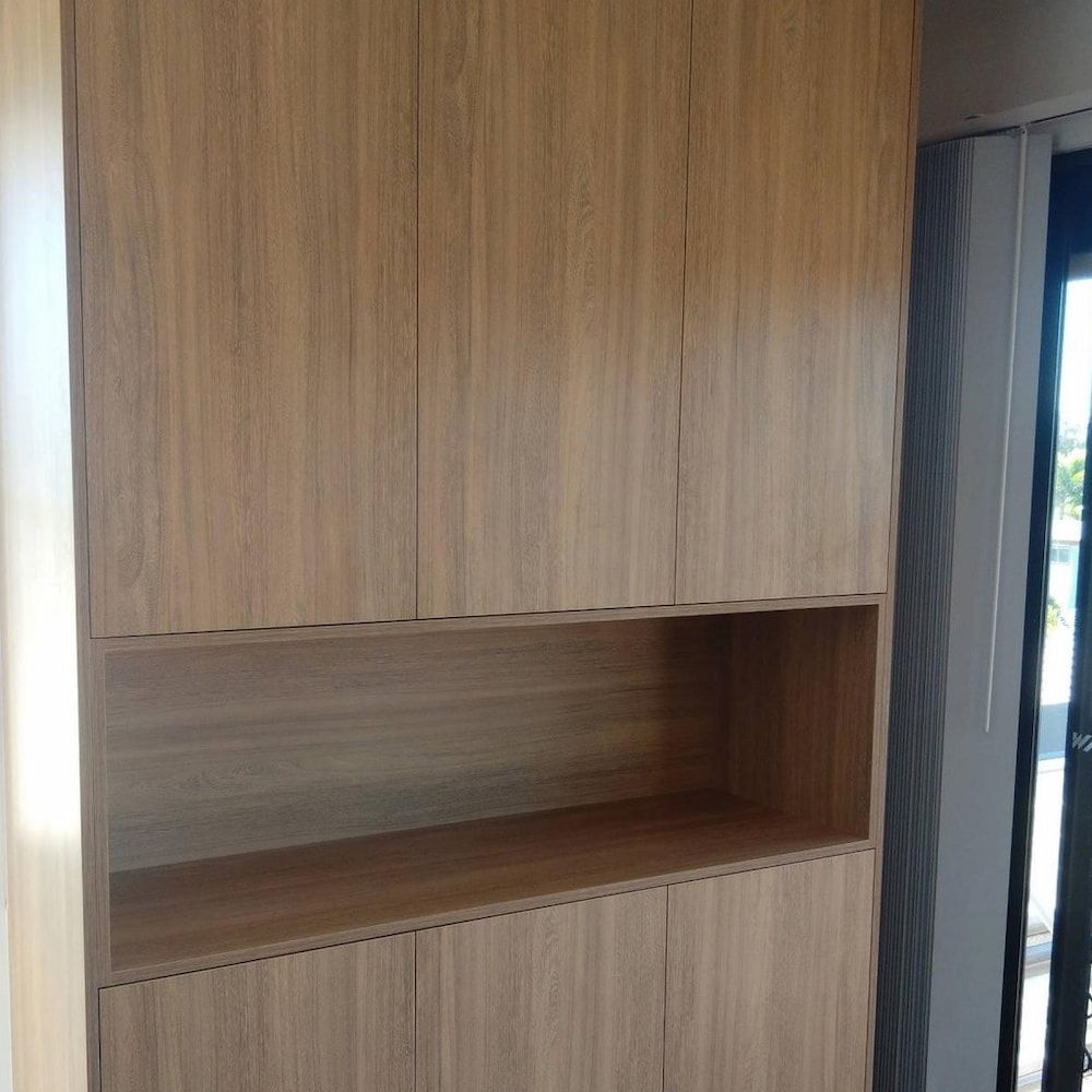 There Is A Shelf In The Middle Of The Cabinet — Pioneer Cabinets in Sarina, QLD