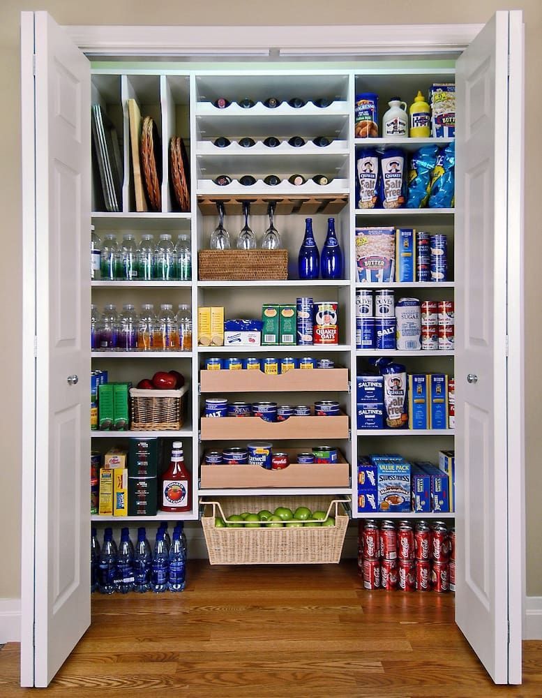 A Pantry Filled With Lots Of Food And Drinks — Pioneer Cabinets in Paget, QLD