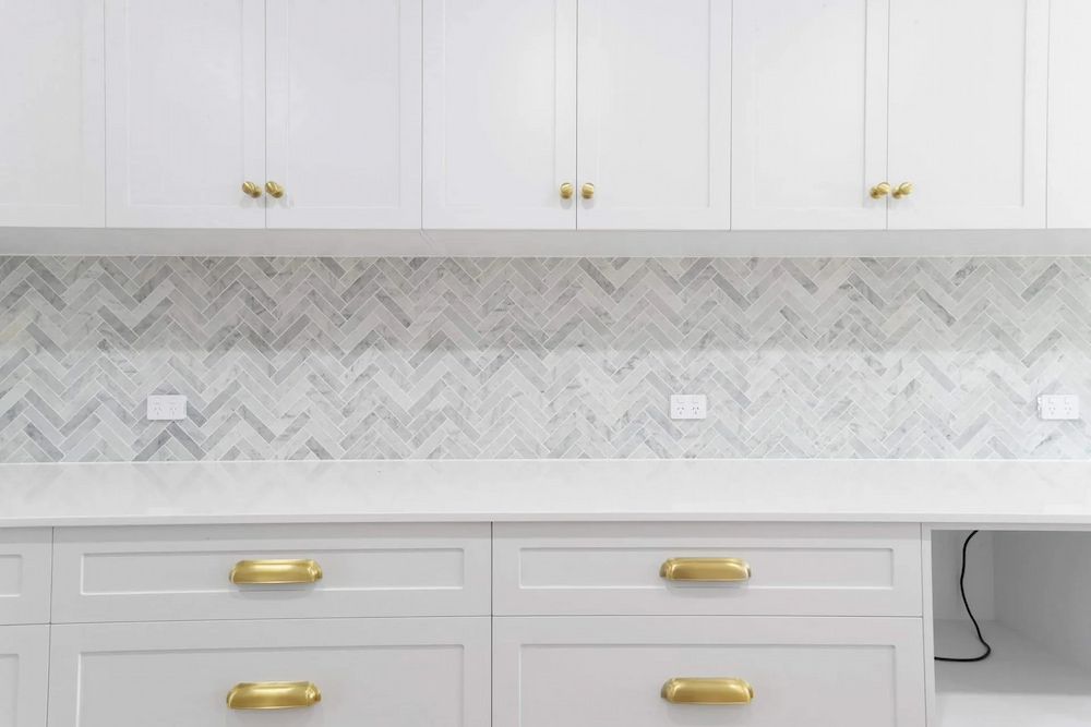 A Kitchen With White Cabinets — Pioneer Cabinets in Paget, QLD
