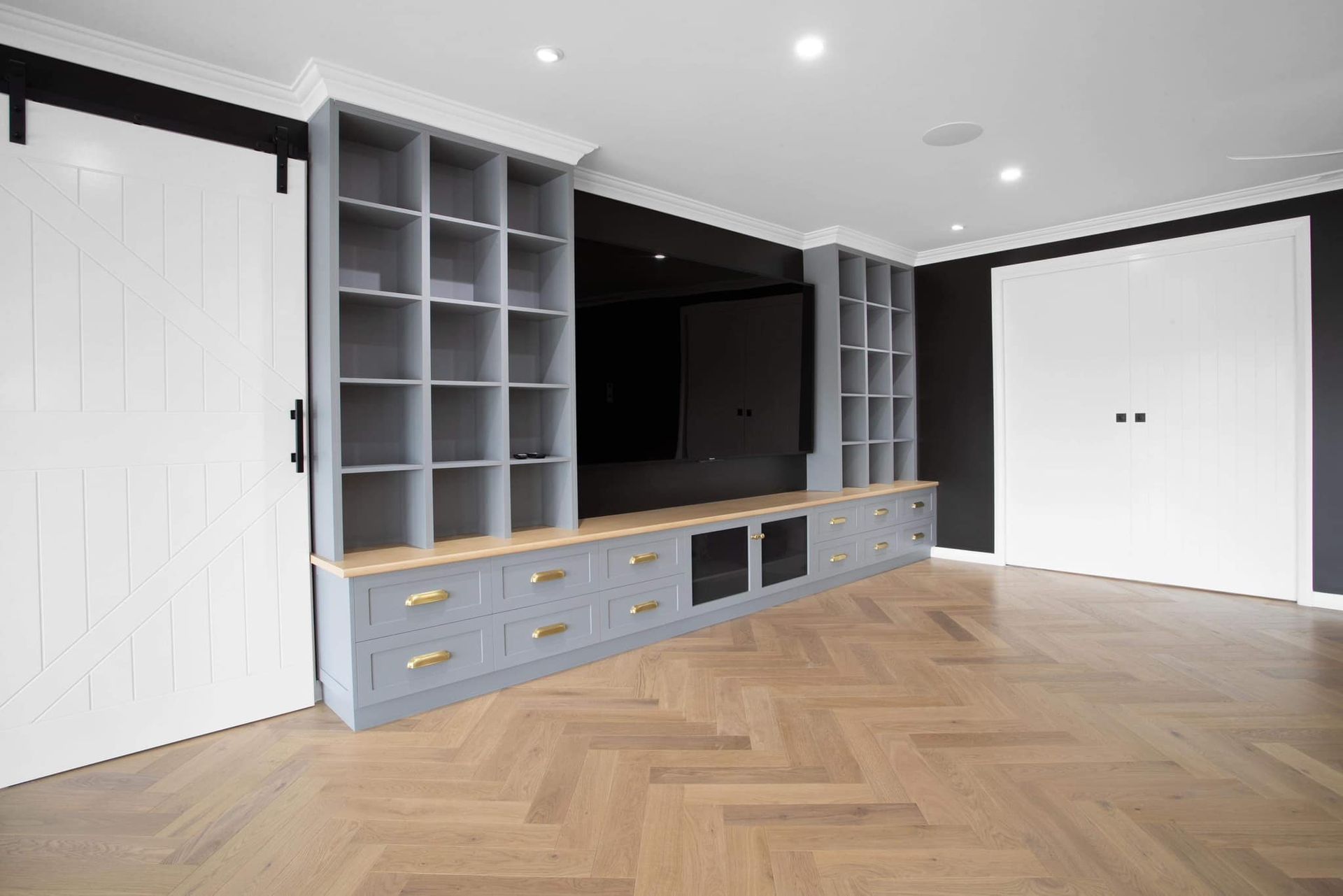A Walk In Closet With Lots Of Clothes And Shoes — Pioneer Cabinets in Sarina, QLD