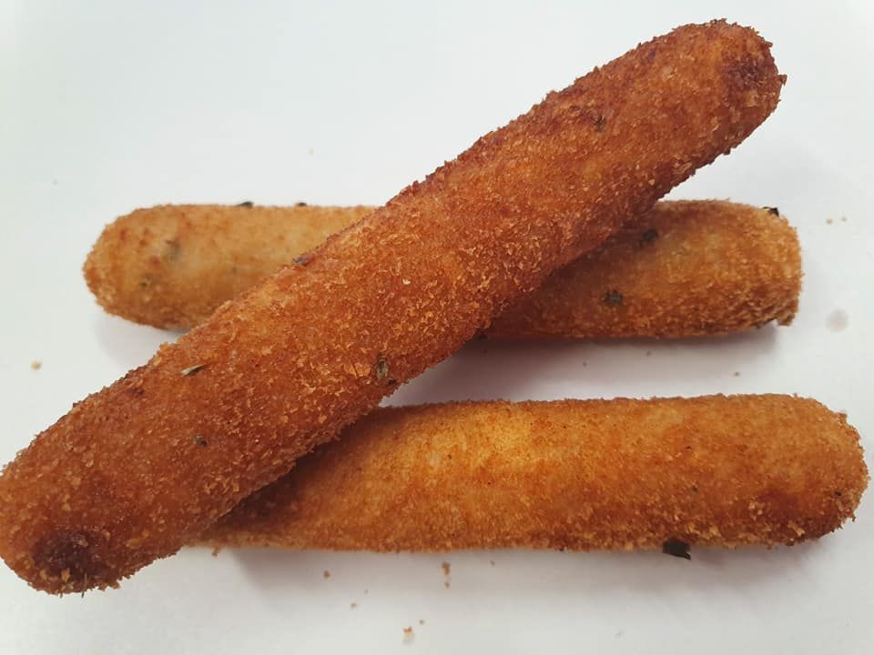 Three Golden, Breaded, Fried Cheese Sticks, Stacked on A White Surface — Mount Louisa Snack Bar in Mount Louisa, QLD