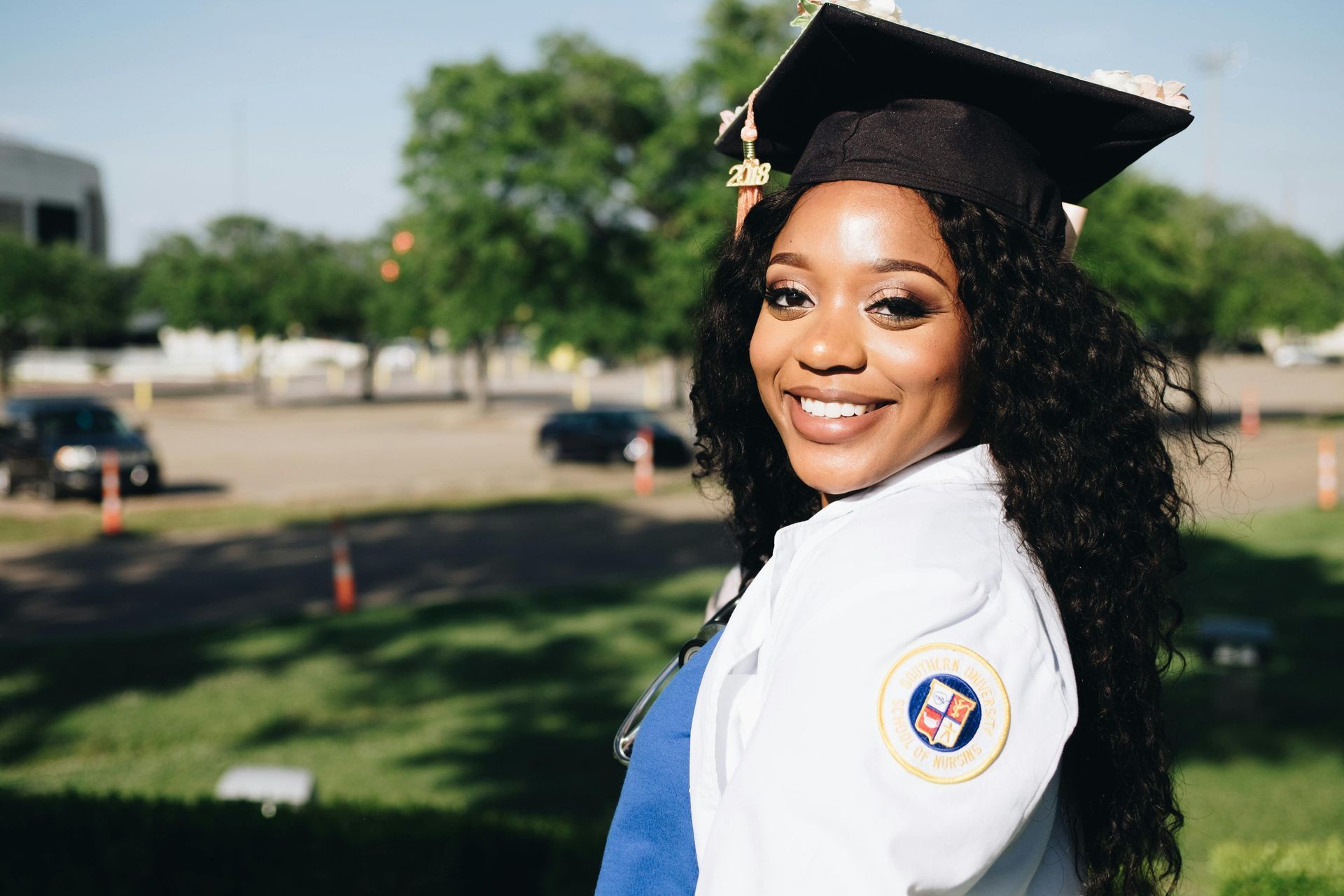 A college graduate with a cap and gown