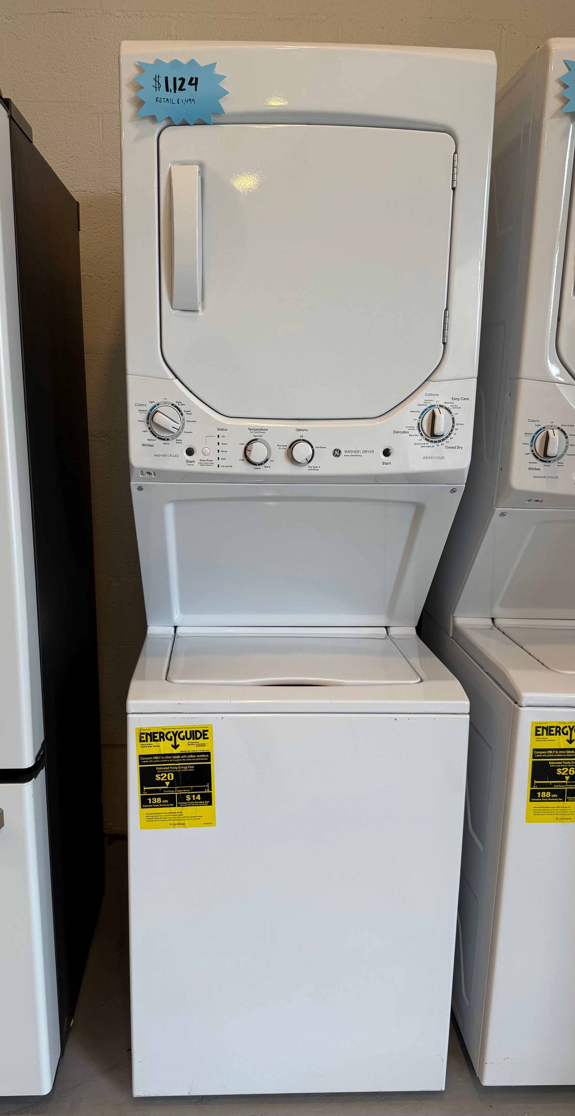 A white washer and dryer are stacked on top of each other.
