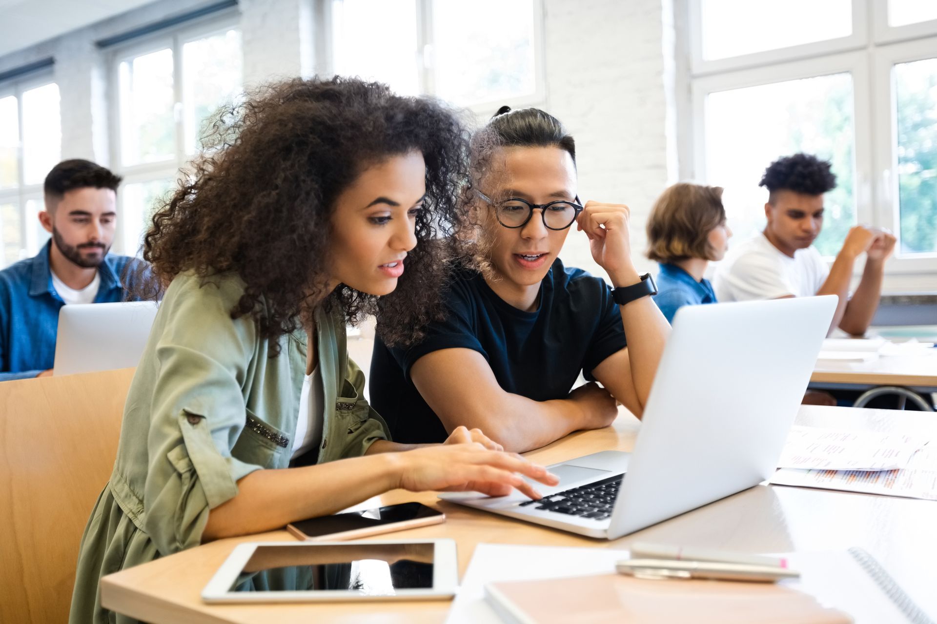 Students working together on a computer