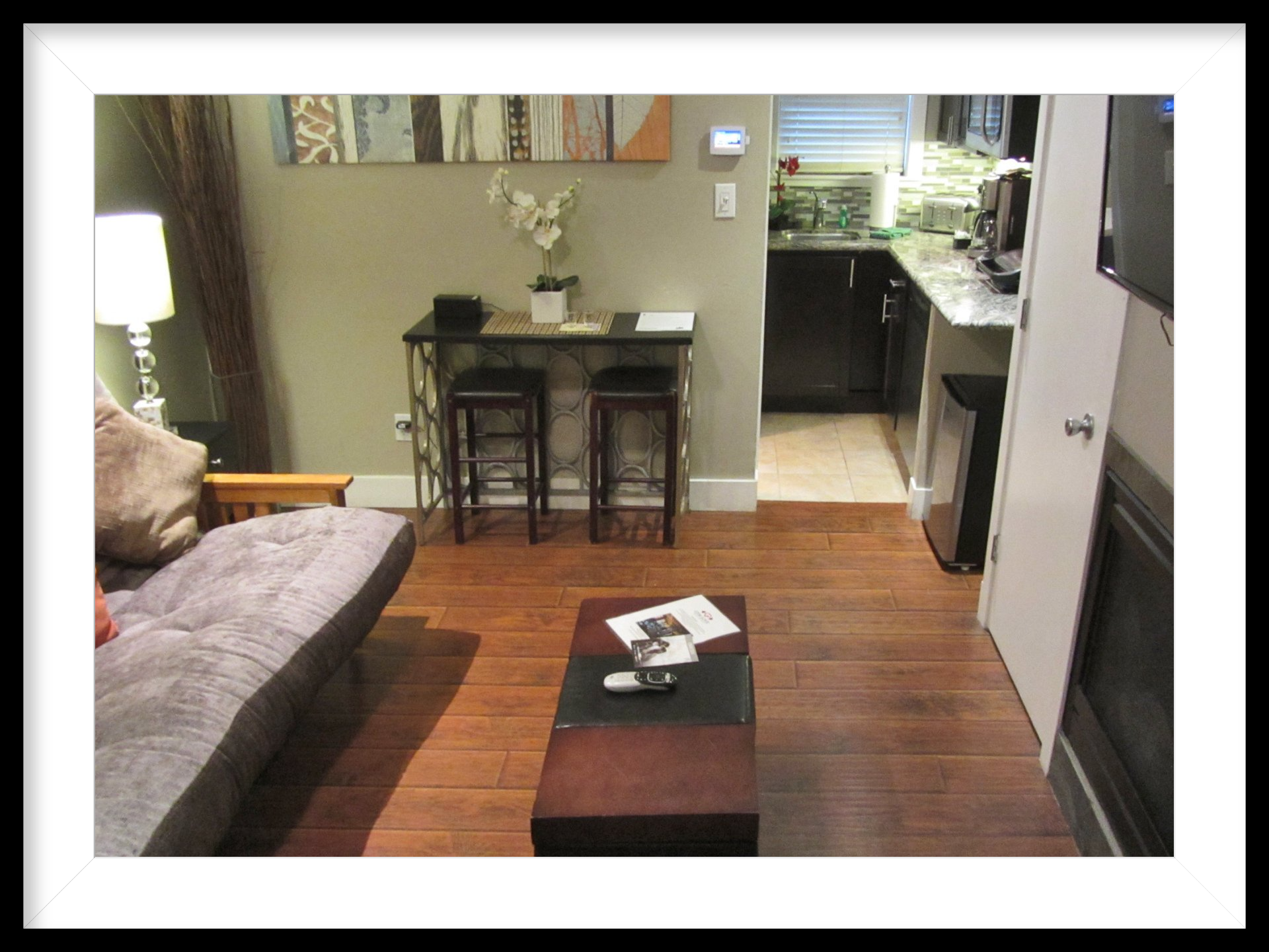 A living room with a couch and a coffee table