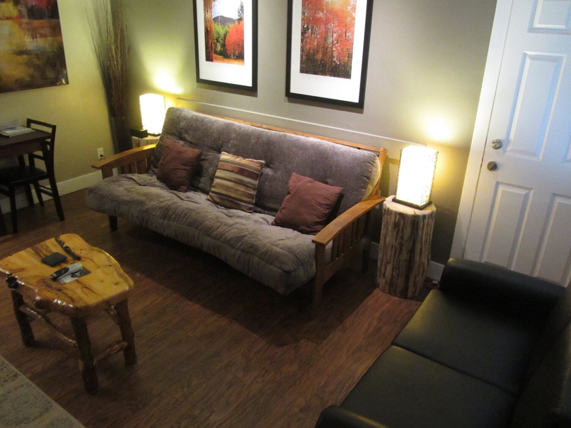 A living room with a couch and a table