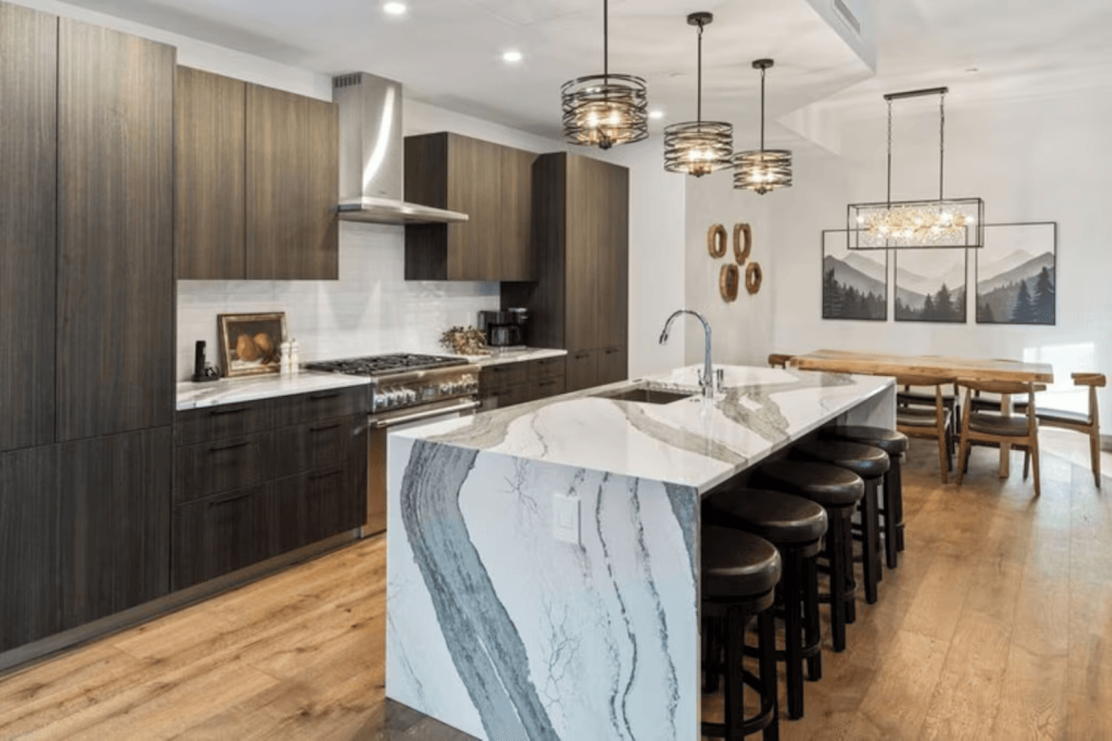 There is a large island in the middle of the kitchen.