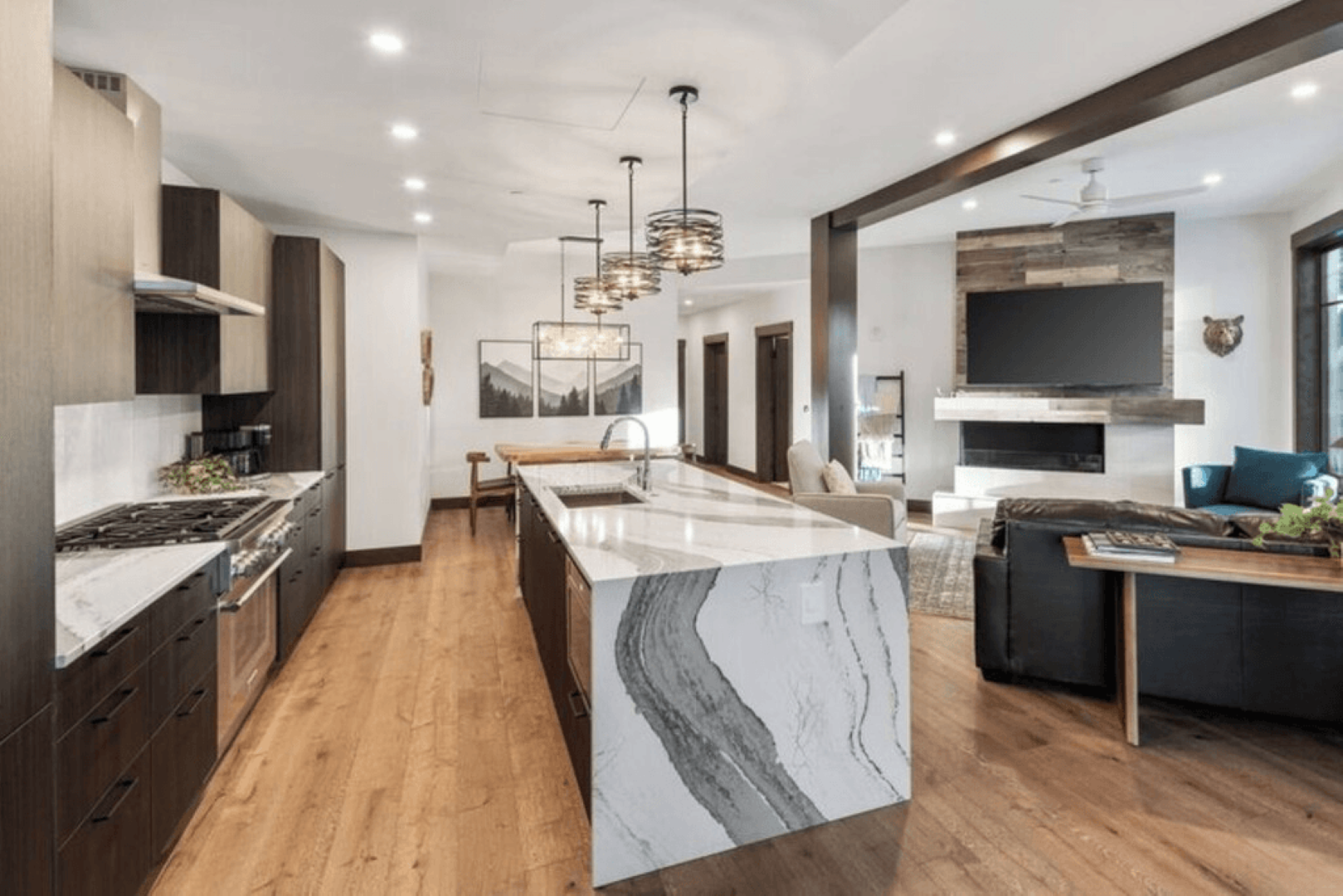 A kitchen with a large island in the middle of the room.