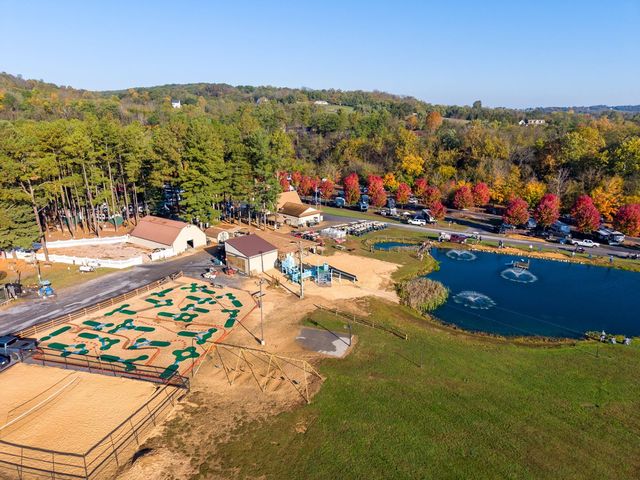 Aerial of the mini-golf course, playground and pond in October