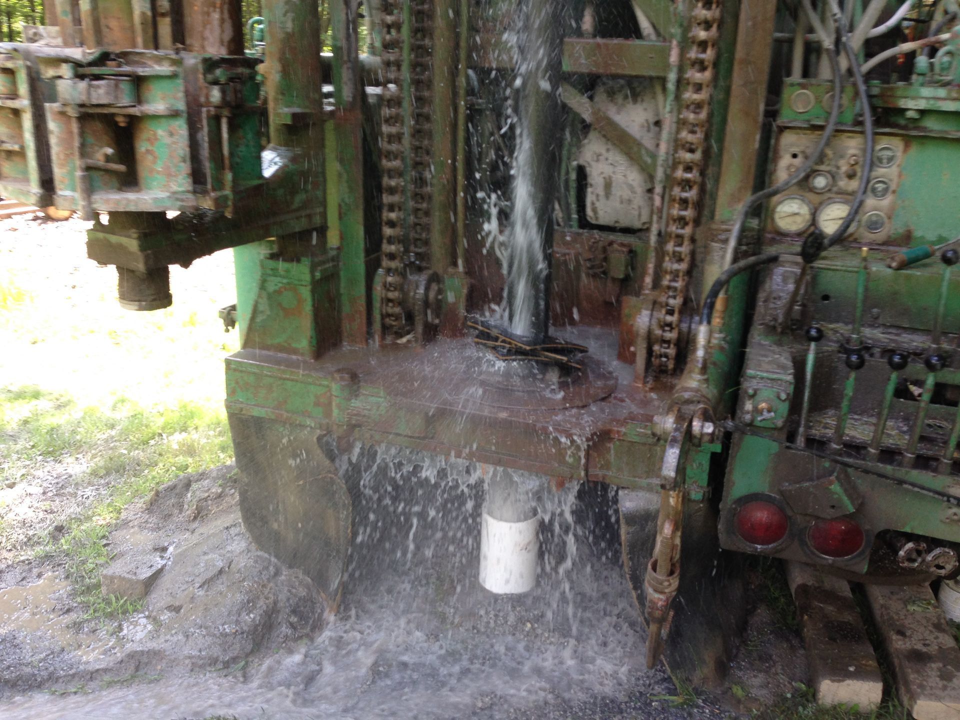 Worker Near Drilling Truck