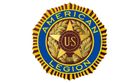 American Legion circular emblem with gold laurel, blue ring, and red center with “US” initials
