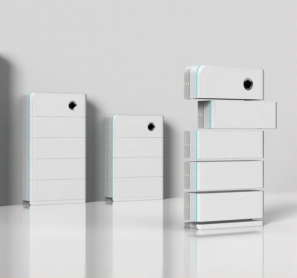 White file folders with blue accents, stacked and arranged on a reflective surface against a white wall.