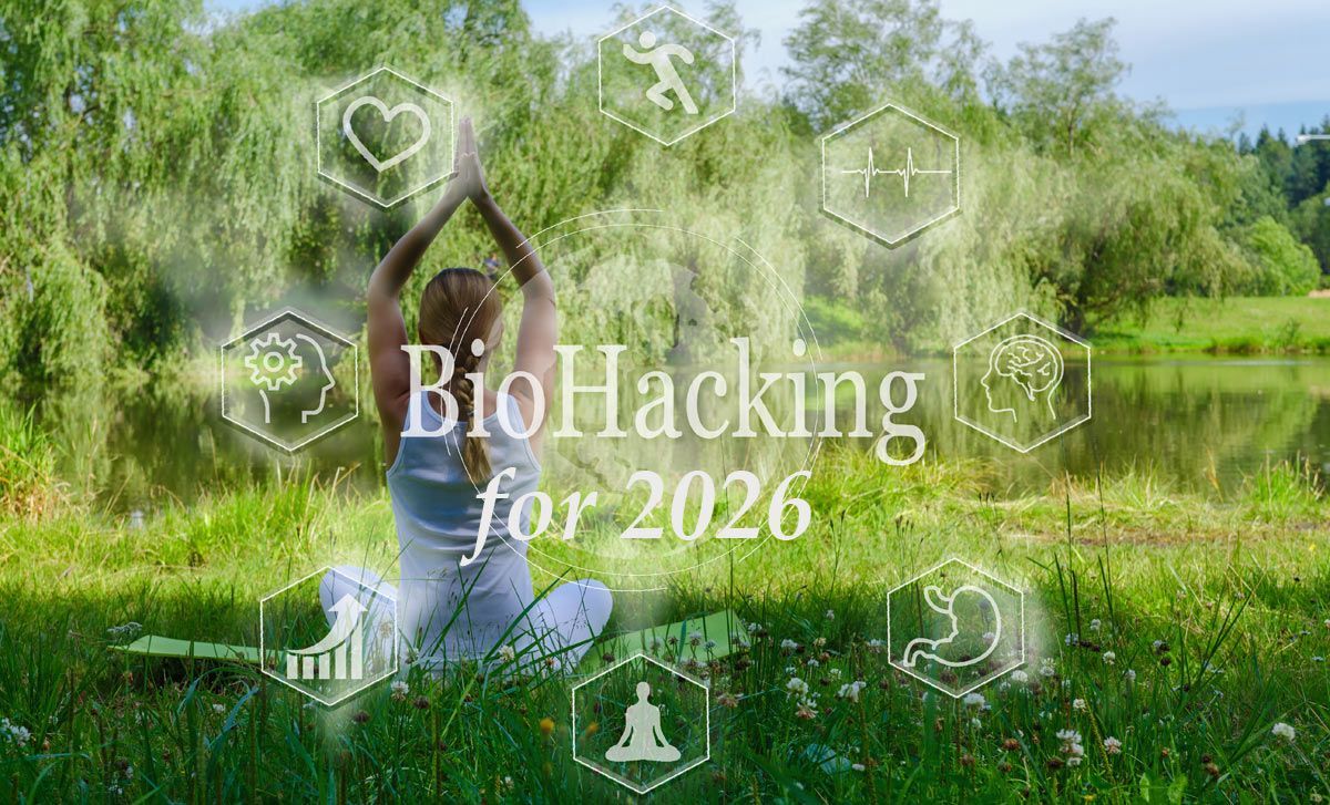 Woman meditating by a lake. Text overlay: BioHacking for 2026. Graphics of health & wellness concepts. Green setting.