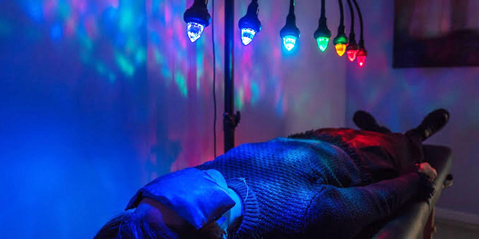 Man Using the Chakra Light Therapy Device at Healing Arts NYC