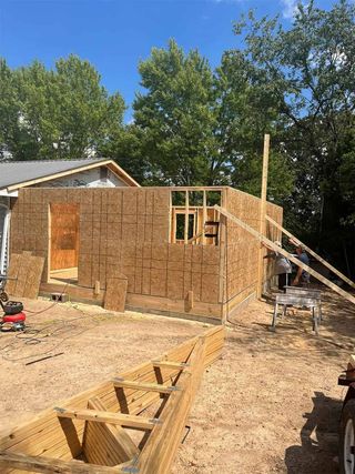 Partially built house with wooden framing Partially built house with wooden framing