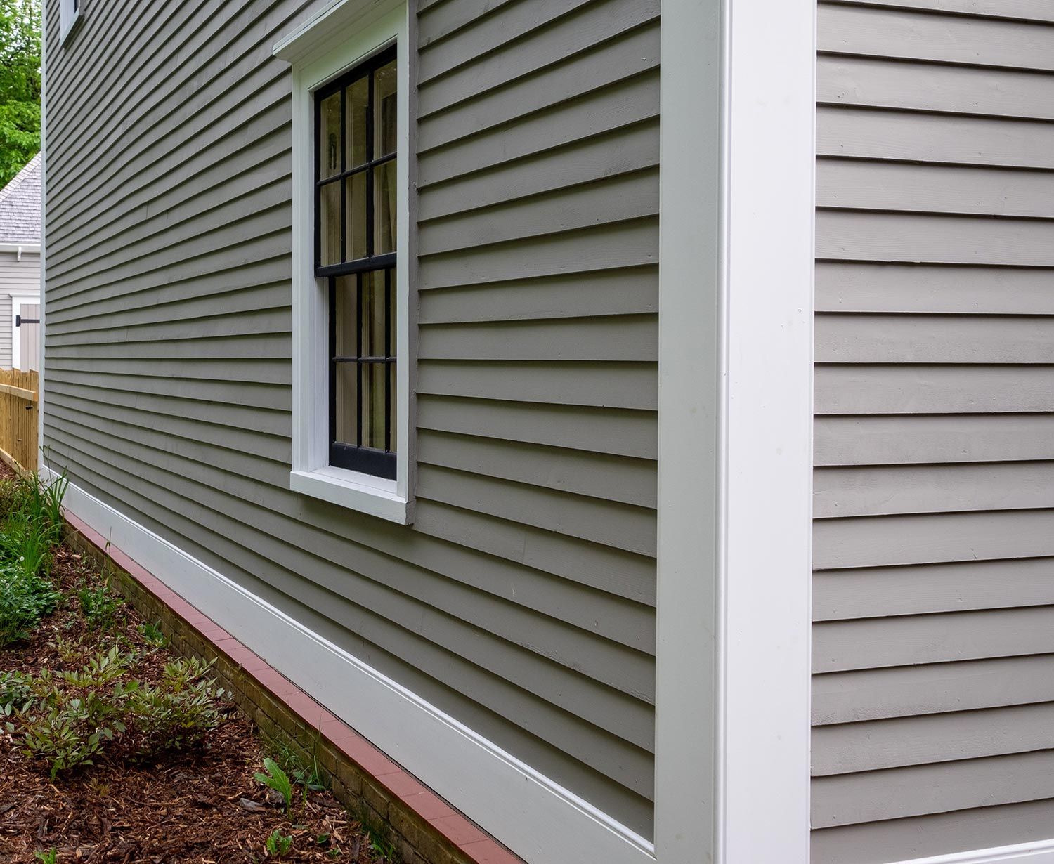 Installed house siding and window