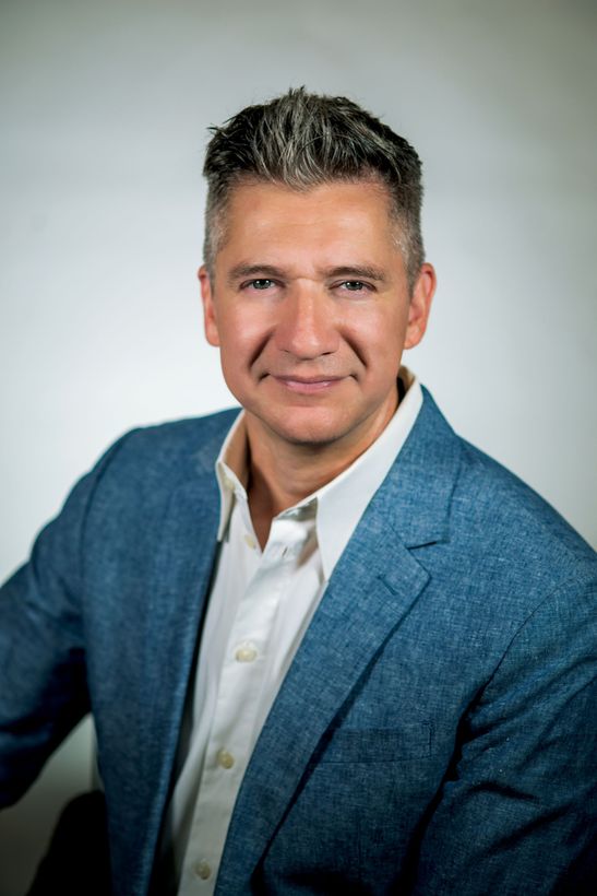 Professional portrait of Realtor, Alexis Estevez.