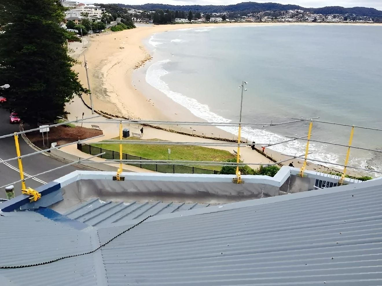 A View of A Beach from The Top of A Building — Site Safety NSW in Sandgate, NSW