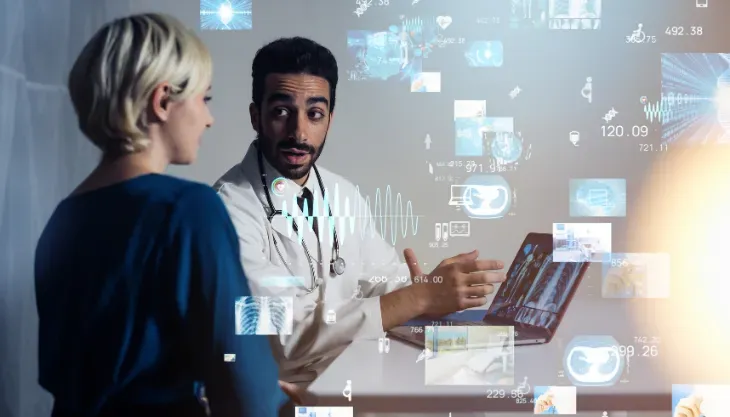 Doctor showing patient an difference between emr and ehr