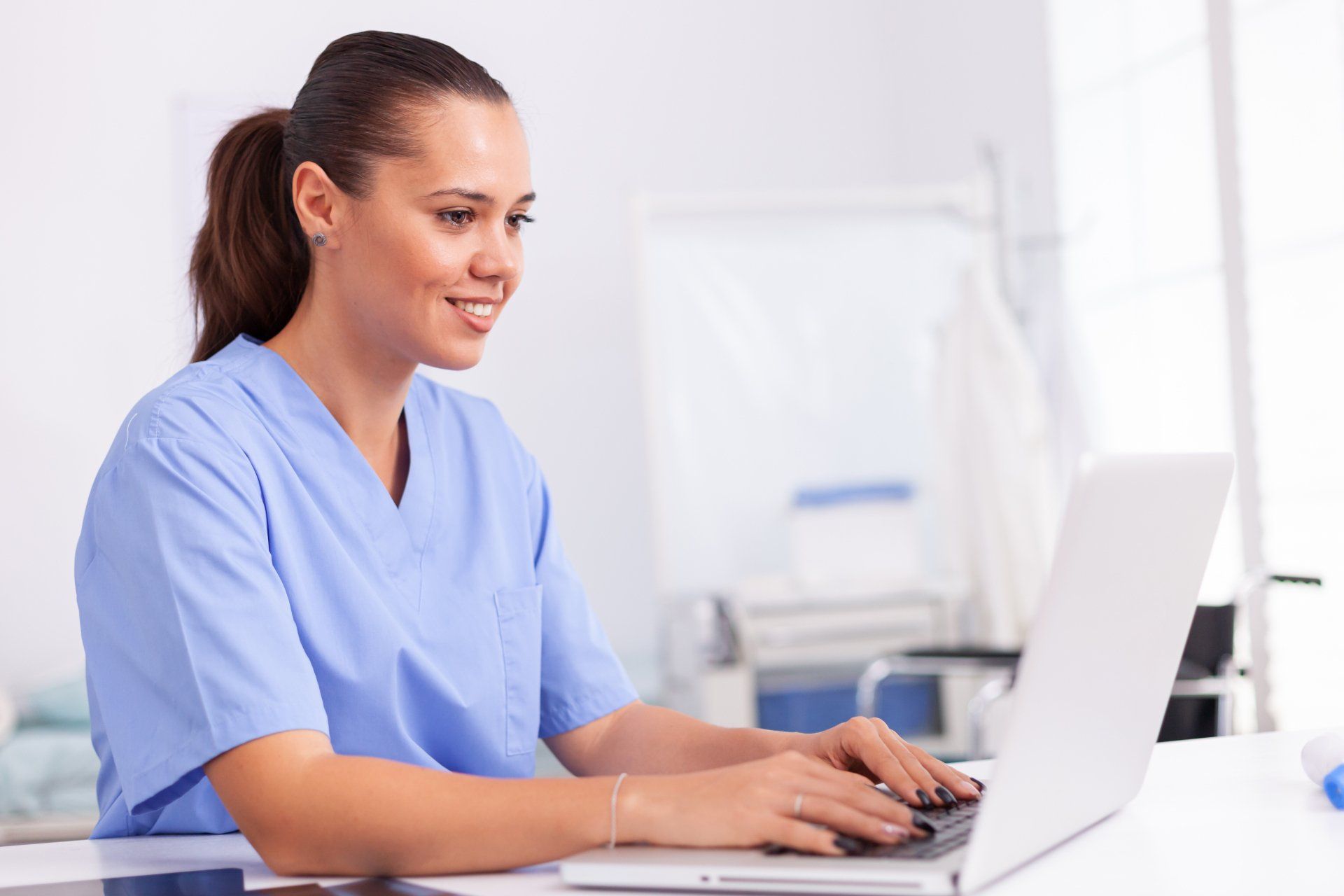 Doctor booking and checking appointments on her iPad