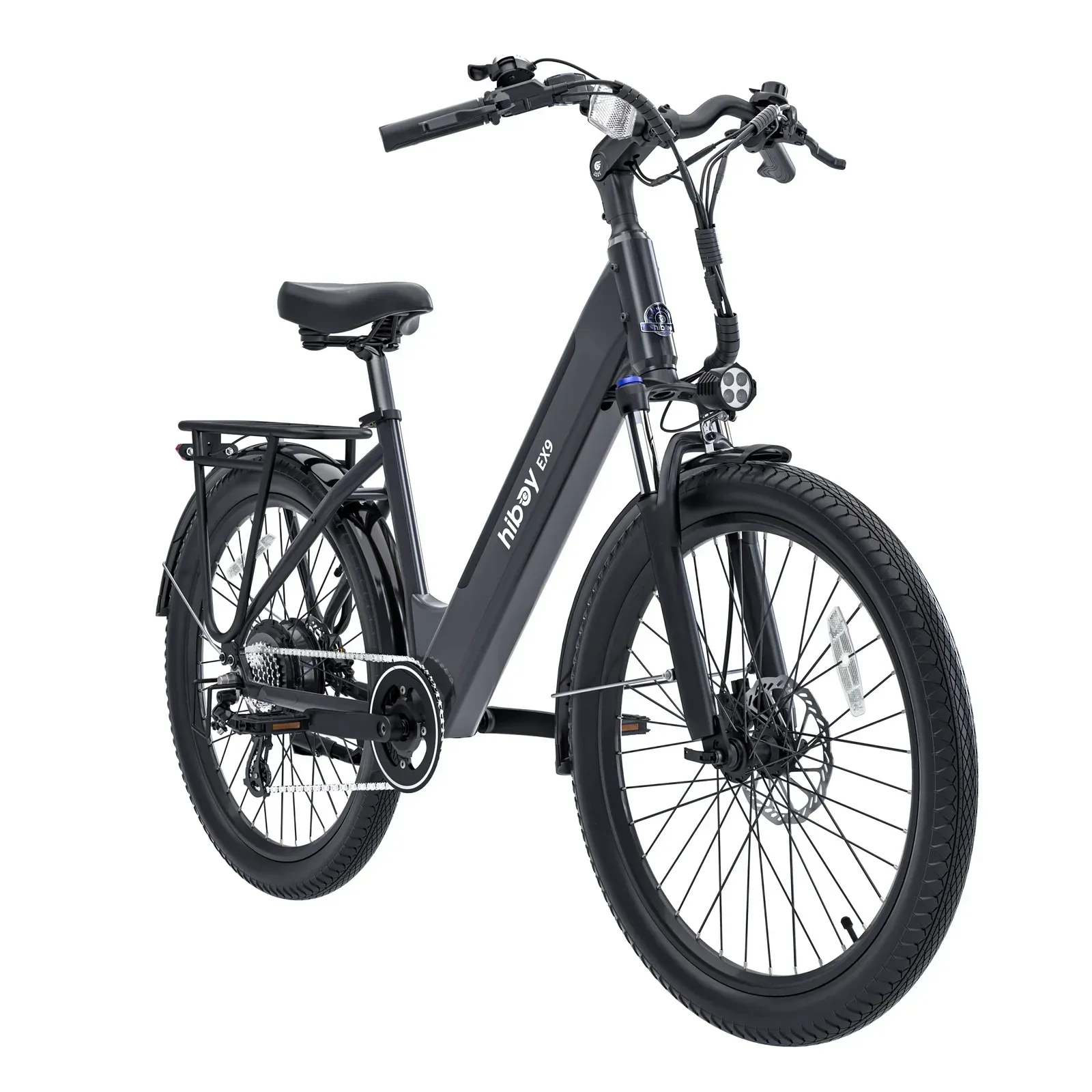 Black electric bicycle with thick tires, rack, and headlight.