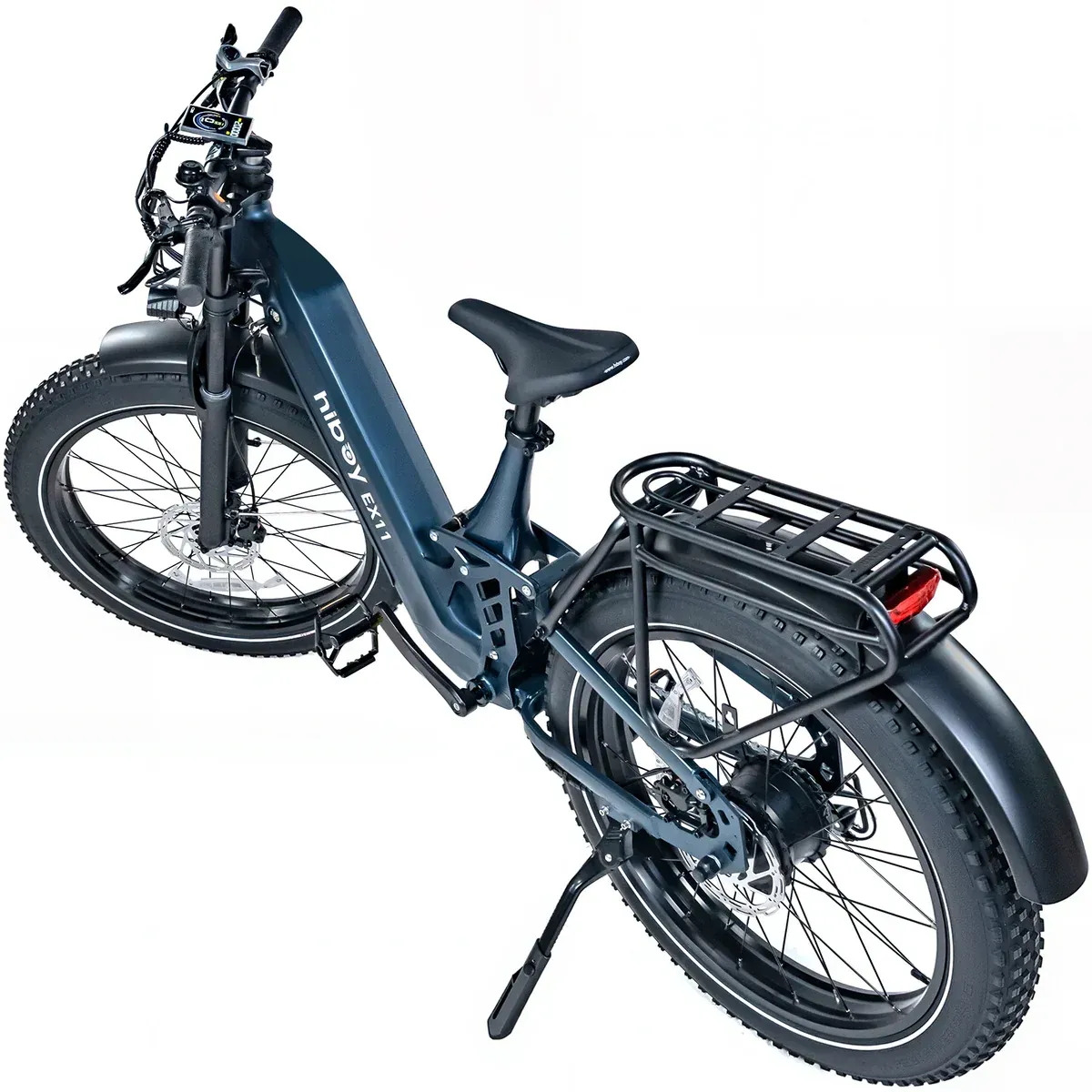Purple electric fat tire bicycle with black fenders and rack.