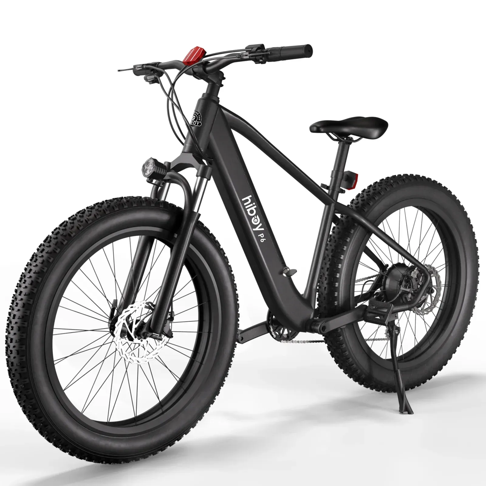 Black electric fat tire bike with thick tires, front headlight, and rear tail light.