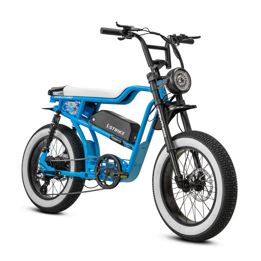 Blue electric bike with black tires and white sidewalls.