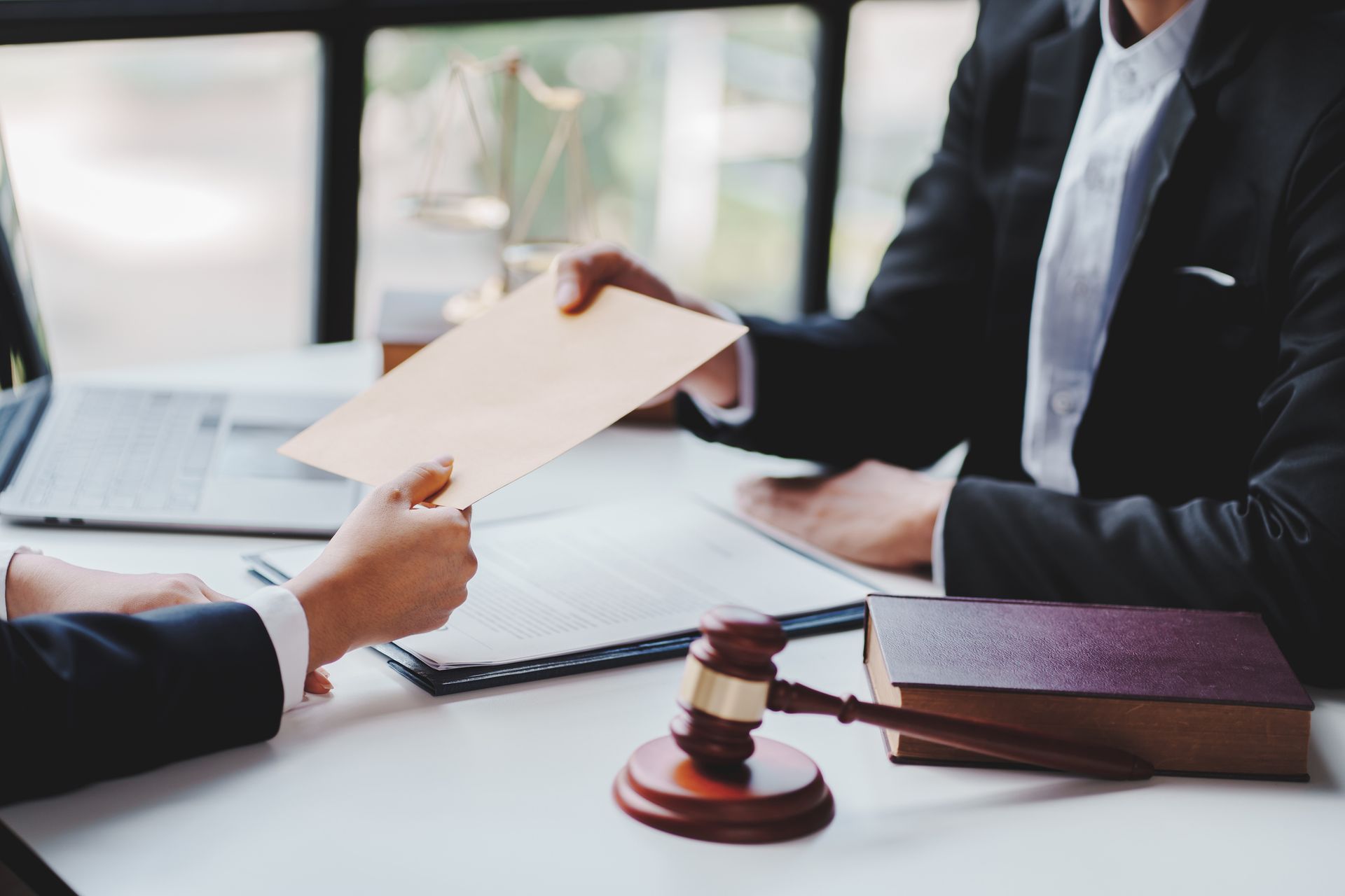 A judge handing a document to a person | bail bonds in Glendale CA | VG Bail Bonds