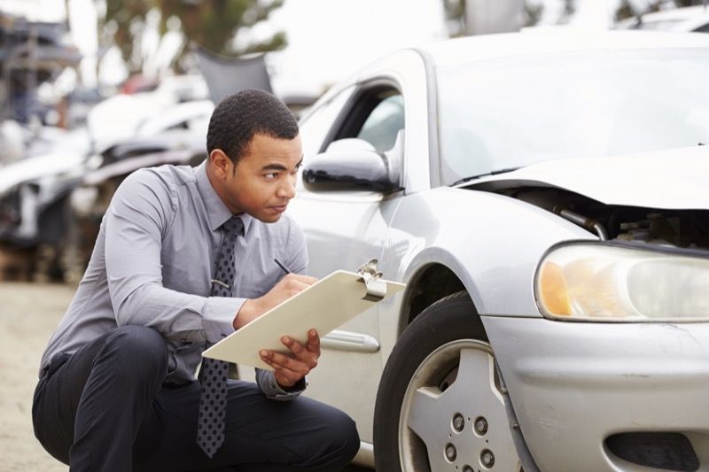 image of an inspector after a car accident