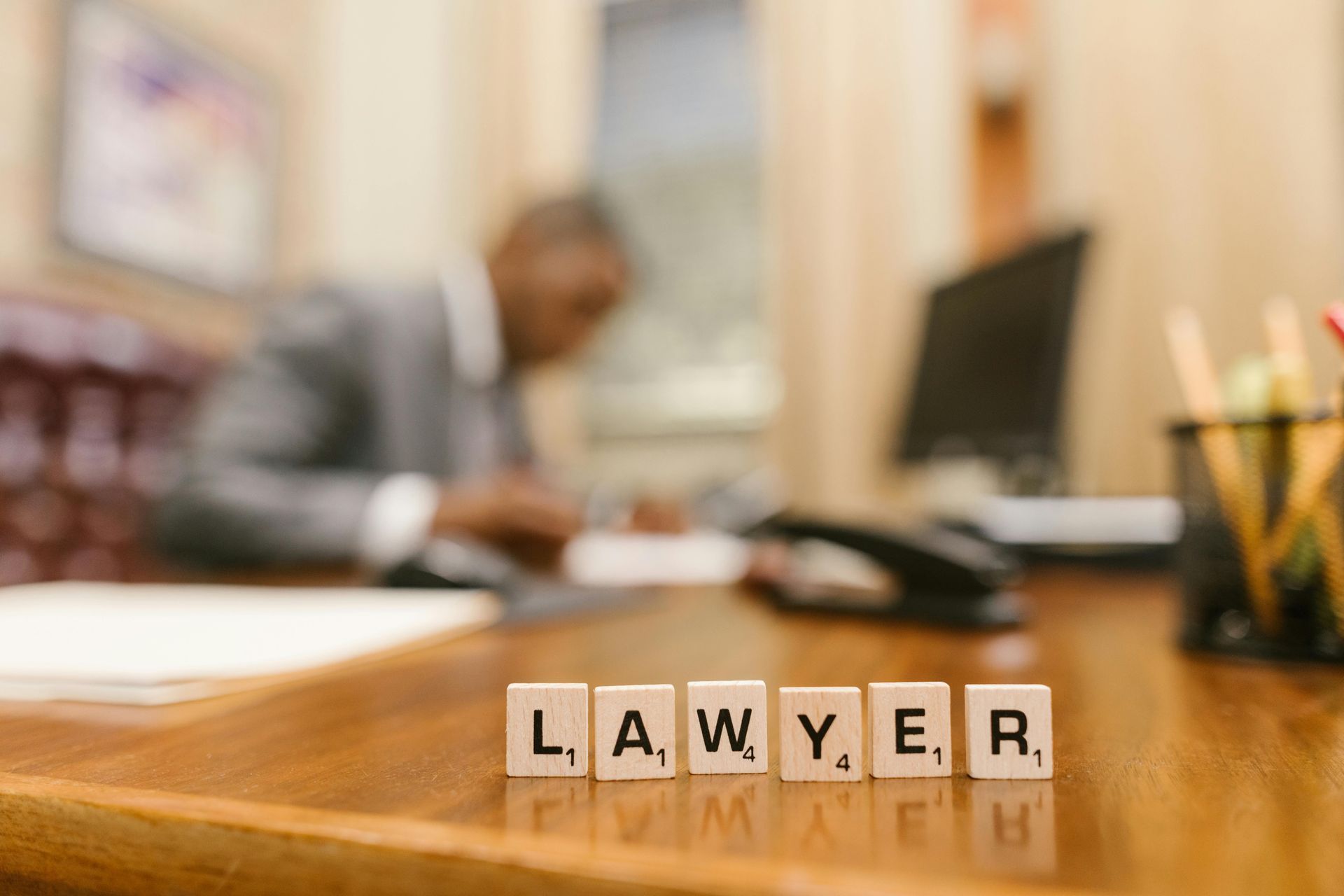 auto accident lawyer working in the background