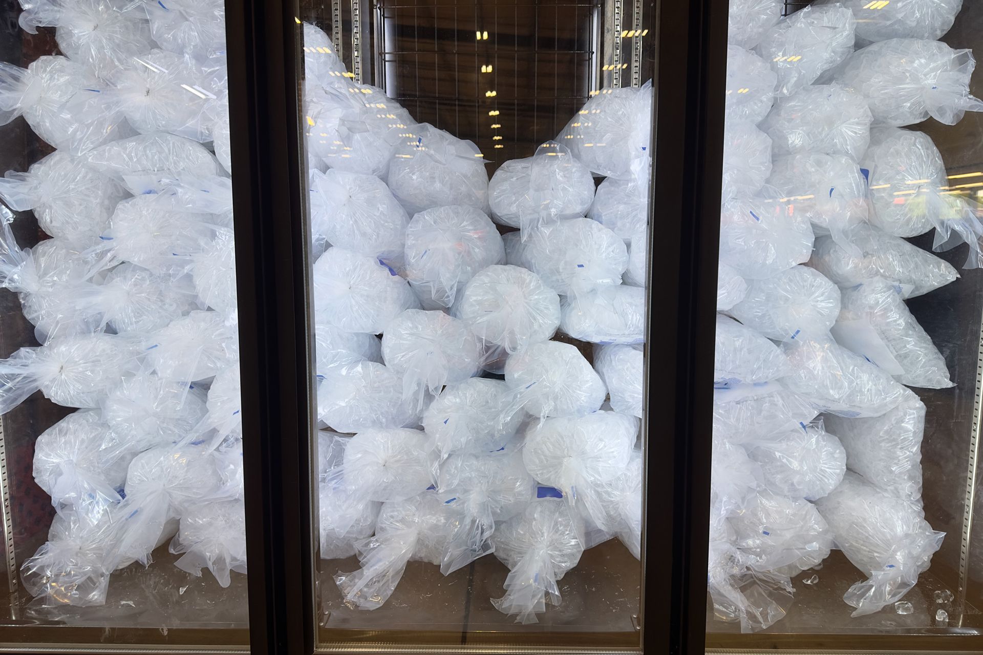 Bagged ice supply for sale inside a chiller. Bagged ice supply for sale inside a chiller.