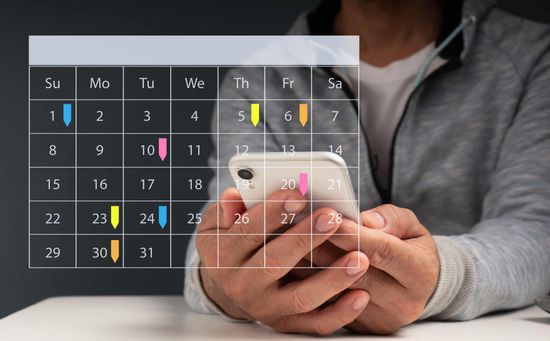 a man checking his calendar on his phone, overlaid with a picture of a calendar on top of the image