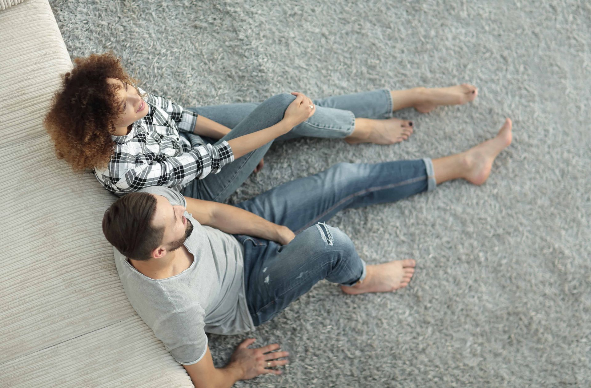 a couple relaxing on their new flooring in Kennewick WA