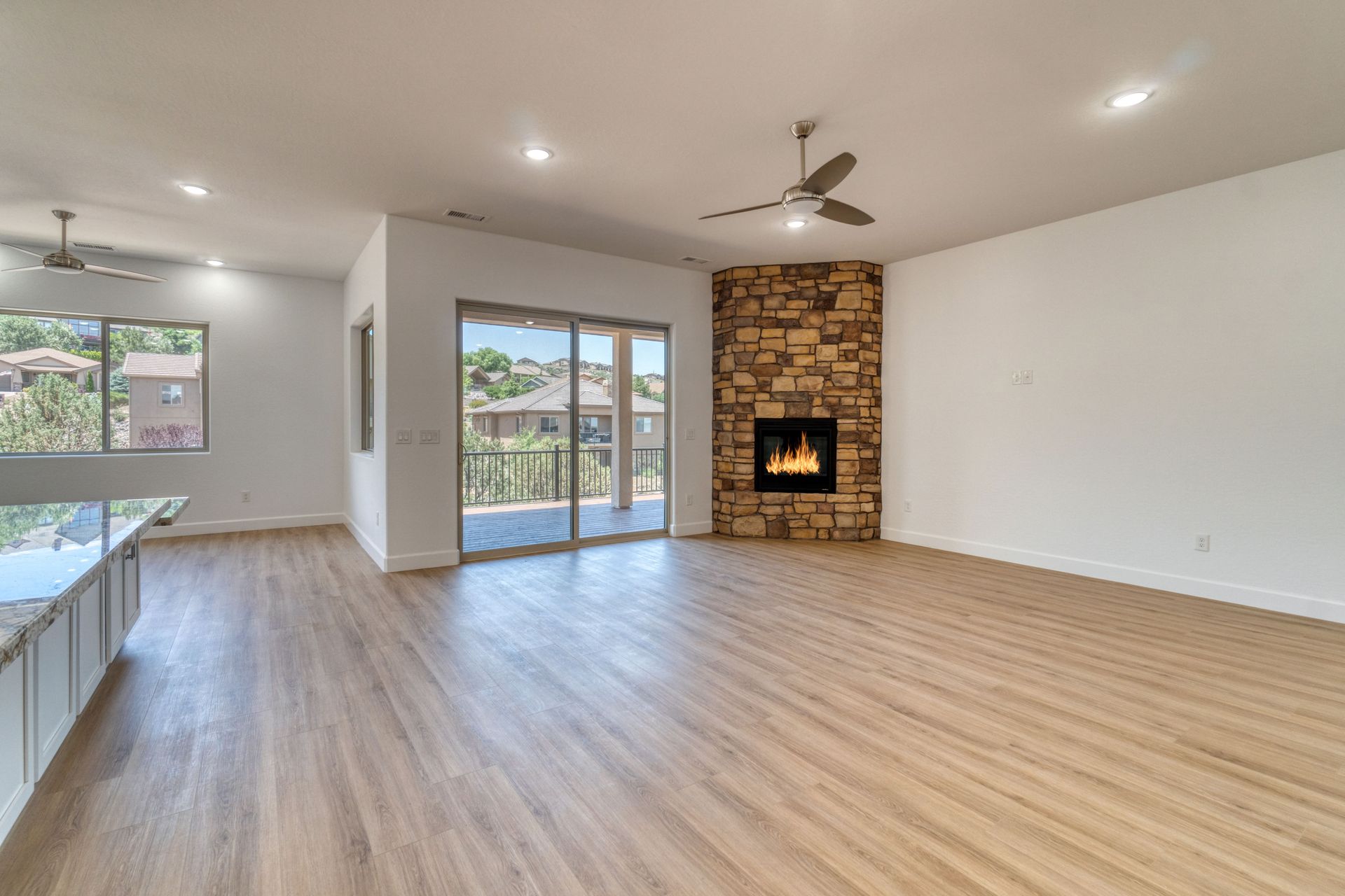 Richland living room with light colored hardwood flooring