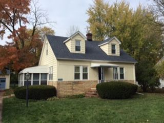 House with shingle roof