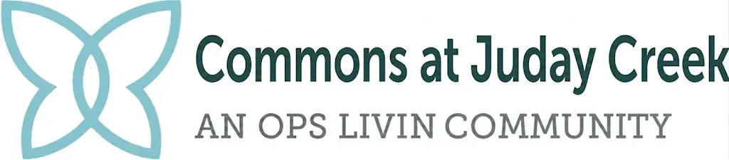 Logo for Commons at Juday Creek, an OPs Livin Community, in teal and gray text with abstract leaf icon