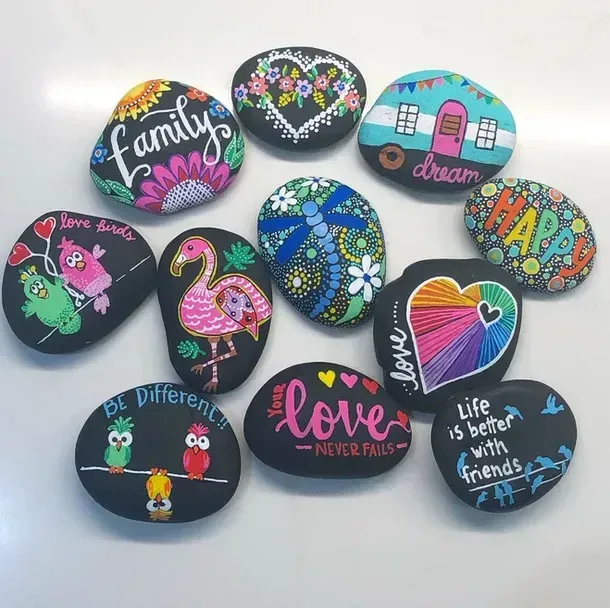 Painted rocks with colorful designs and inspirational words.