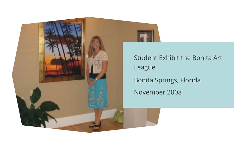 Woman stands next to framed painting at the Bonita Art League student exhibit in Bonita Springs, Florida, November 2008.