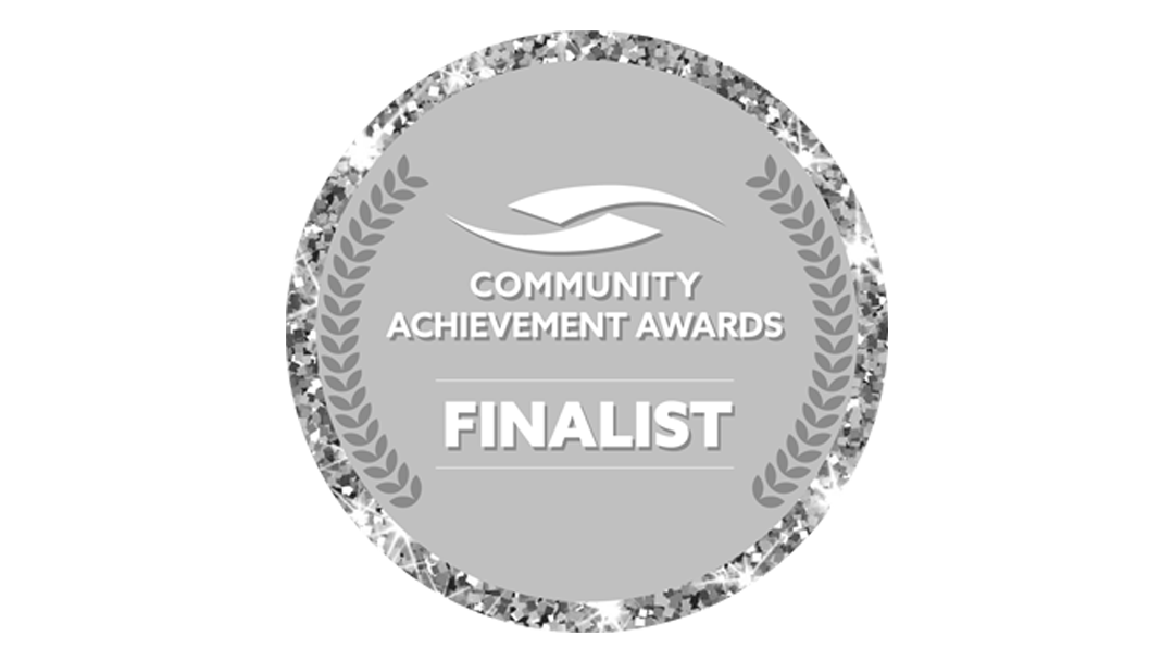 Silver award badge with text: 