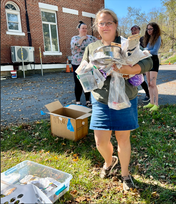 Volunteer spending time with a pet in the community