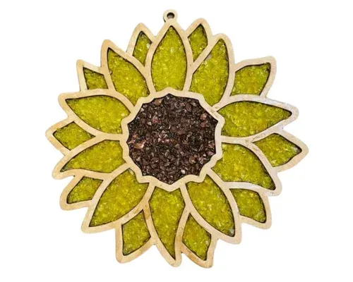 Stylized sunflower with green petals, tan outline, and a dark brown center