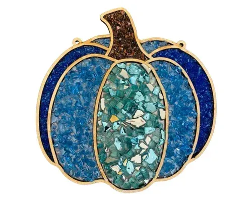 Blue jeweled pumpkin brooch with gold outline and stem, featuring a turquoise center and dark blue sides