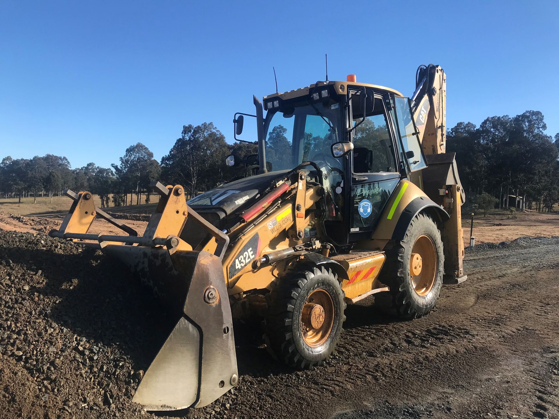 A Backhoe is Loading Dirt — Lantry Earthmoving in Phoenix Park, NSW