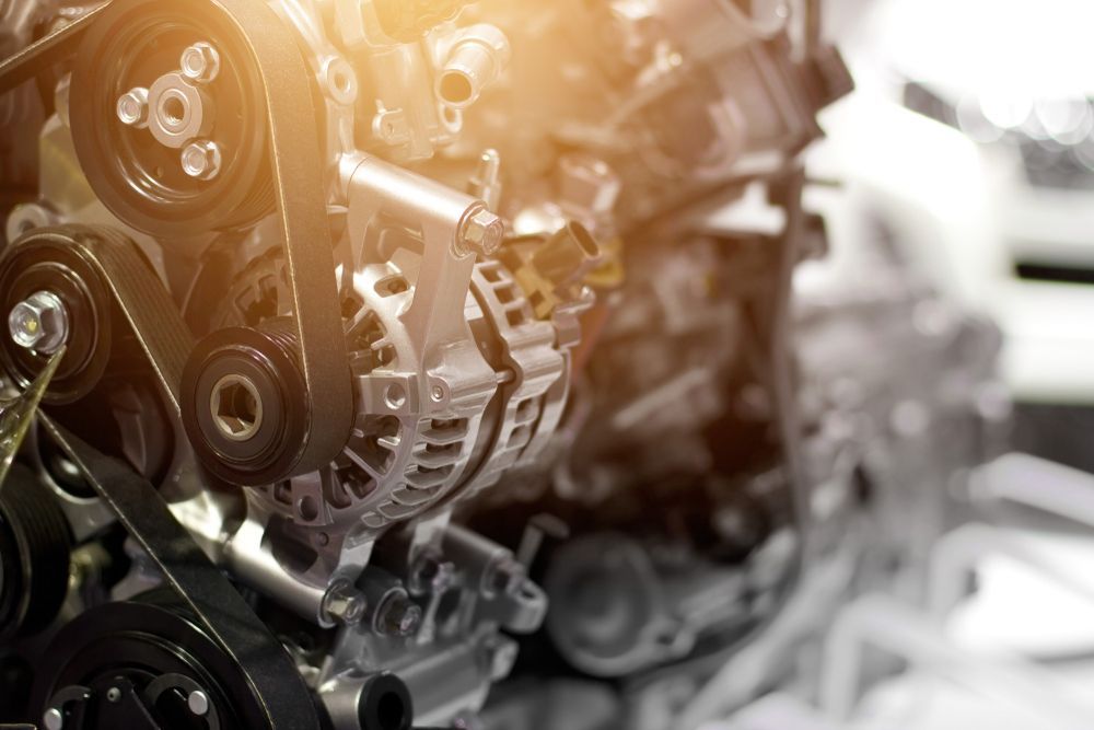 A Close-up of a Modern Car Engine Alternator and Serpentine Belt System — Mick Dunn Motor Repairs in Mackay, QLD