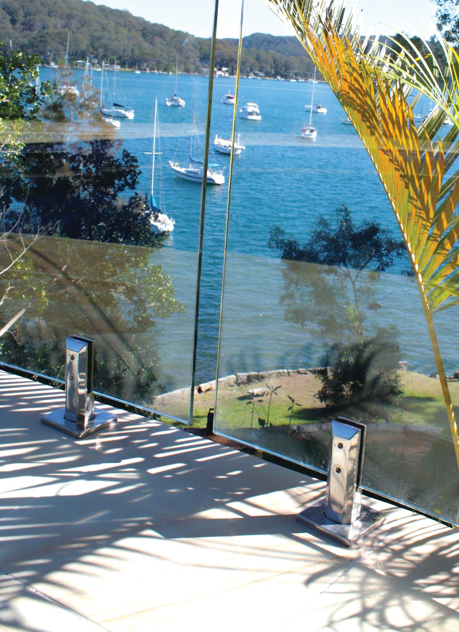 Glass Railing with Metal Posts — Coastline Glass Pool Fencing in Old Bar, NSW
