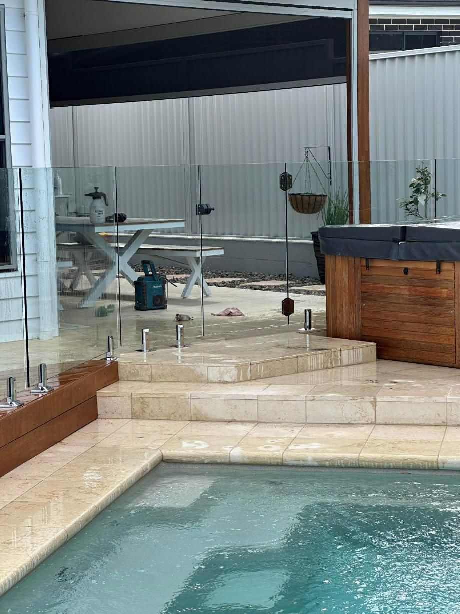 A Backyard Swimming Pool Area — Coastline Glass Pool Fencing in Old Bar, NSW