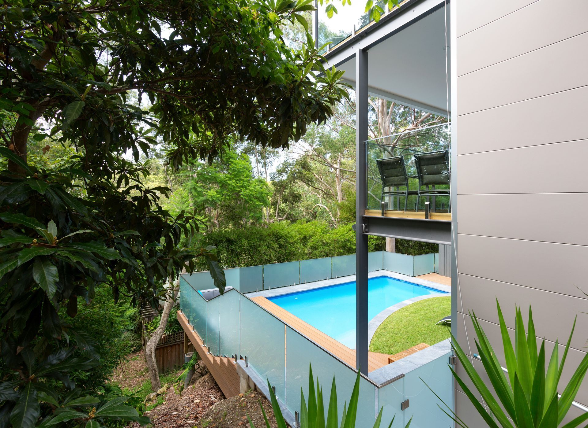 A Bedroom with A Bed and A Bowl on A Nightstand — Coastline Glass Pool Fencing in Gloucester, NSW