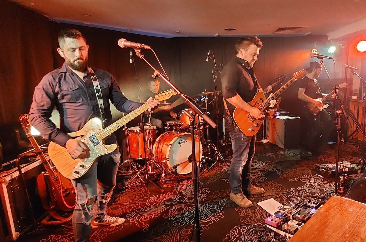 Musician Playing Guitar and Singing Outdoor — Event Equipment Hire in Toowoomba, QLD